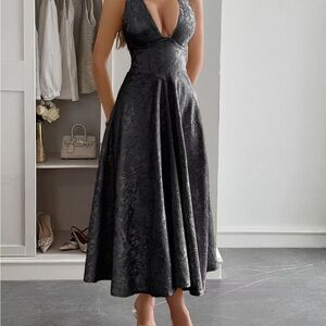 Elegant Black High-Low Dress with Plunging V-Neck